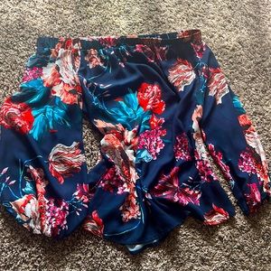 Flattering, dark blue, floral, off the shoulders, women’s blouse.